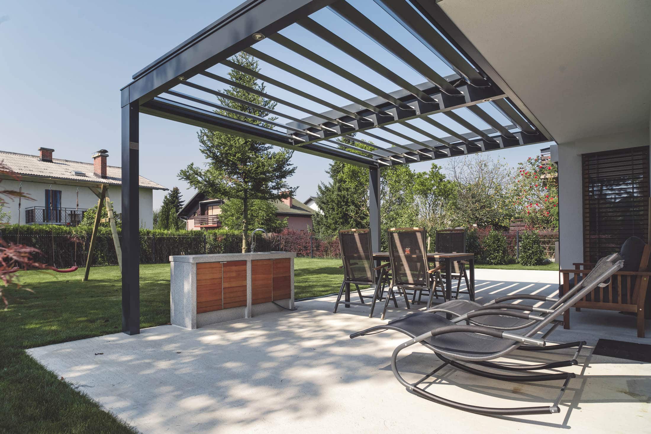 Terrasse en béton avec Pergola
