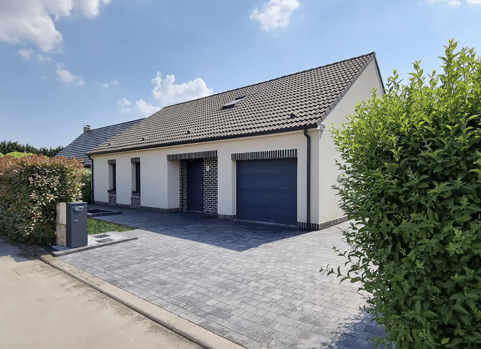 Entrée de garage en pavage